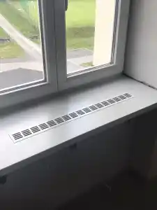 Dodávka a montáž HPL parapetů na konzolích OÚ Bělotín