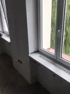 Dodávka a montáž HPL parapetů na konzolích OÚ Bělotín