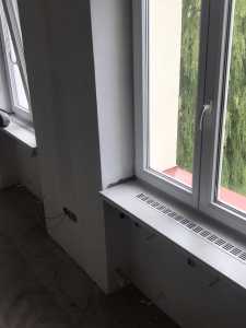 Dodávka a montáž HPL parapetů na konzolích OÚ Bělotín